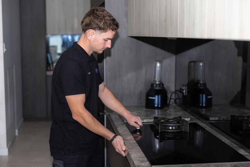 GSK Plumbing Solutions licensed gas fitter working on a gas connection in Sydney