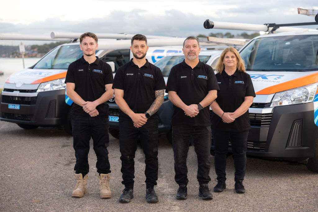 GSK Plumbing Solutions team with branded service van in Sydney